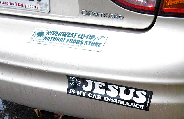 Badge on car: jesus is my car insurance. 